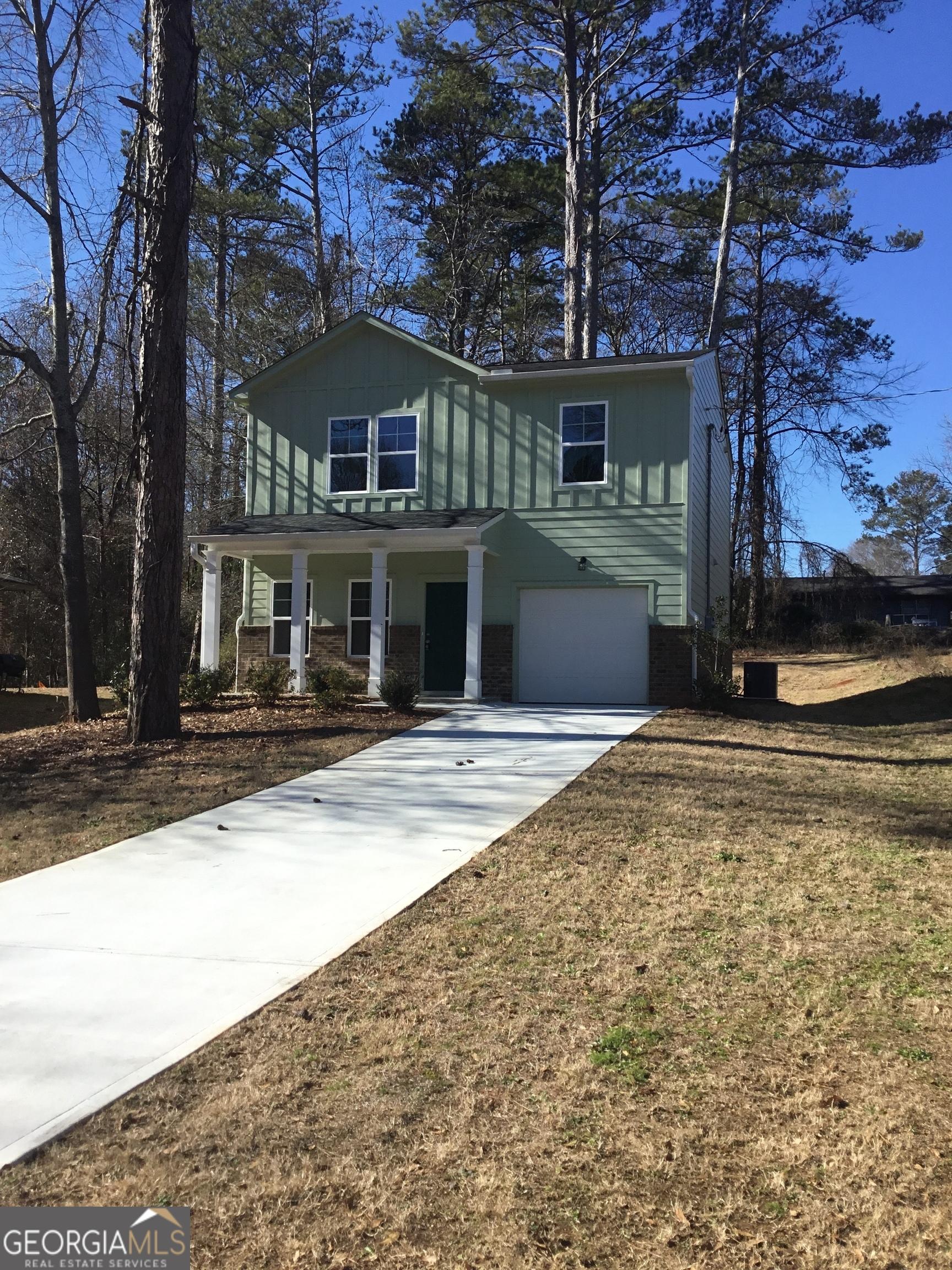 Photo one of 9168 Carr Cir Covington GA 30014 | MLS 10434890G