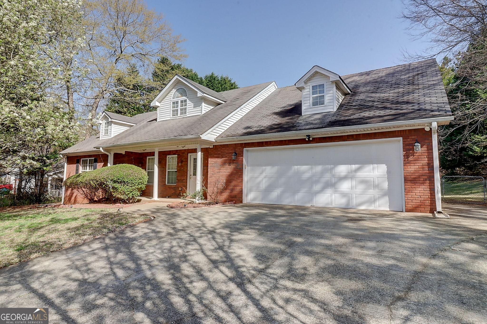 Photo one of 25 Brookstone Ct Covington GA 30016 | MLS 10451944G