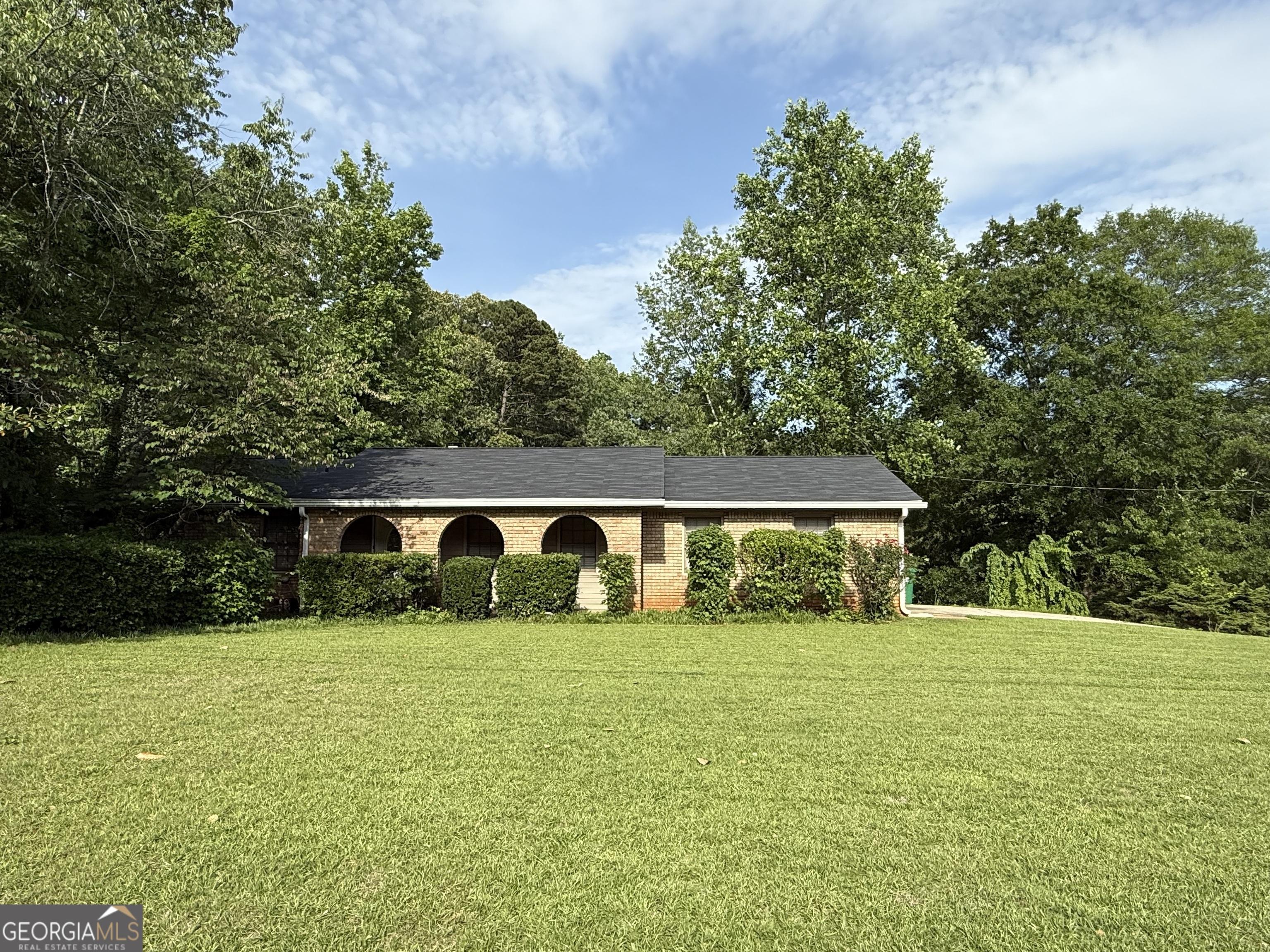 Photo one of 5142 Rock Eagle Dr Stone Mountain GA 30083 | MLS 10473866G