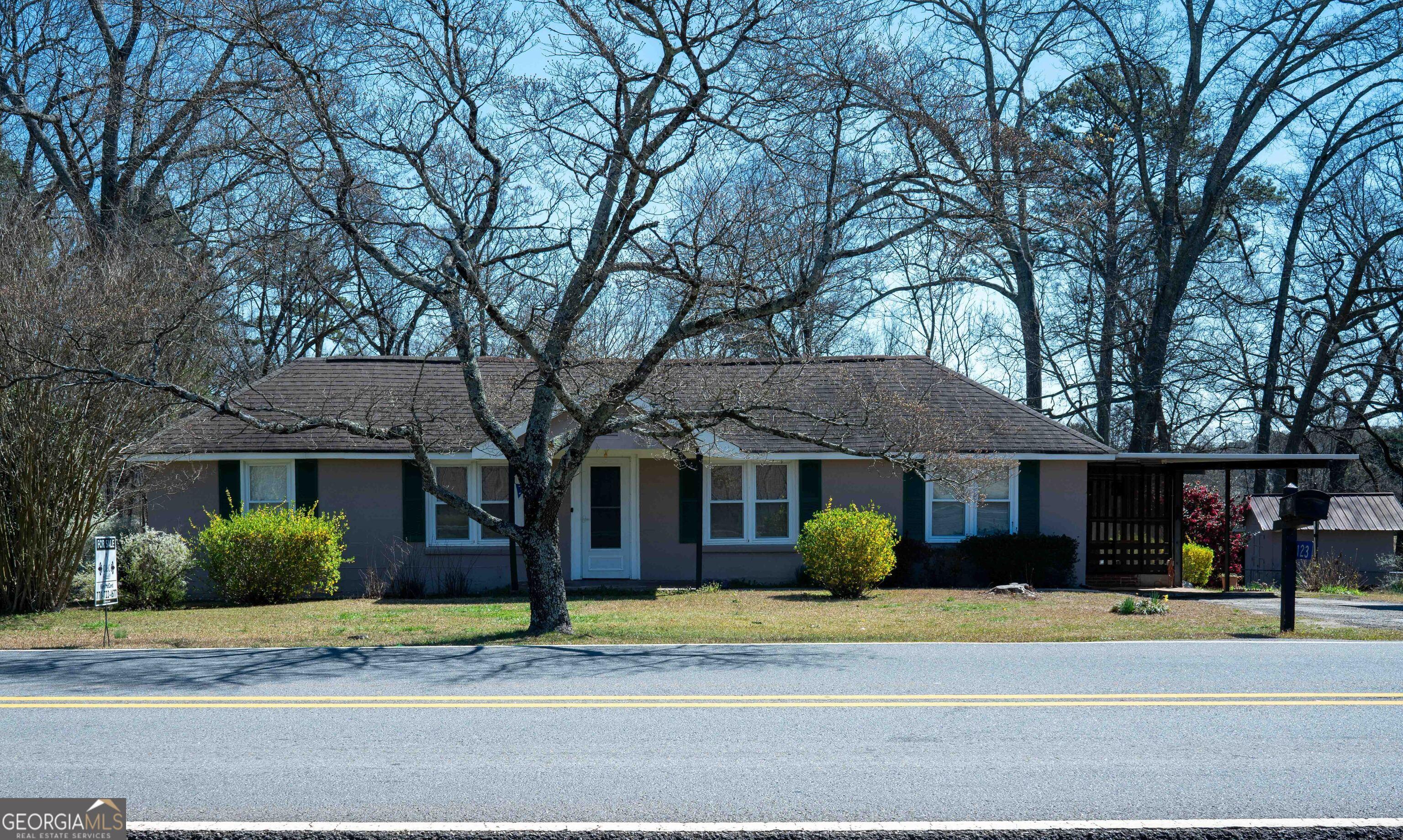 Photo one of 123 Cowan Rd Covington GA 30016 | MLS 10475594G