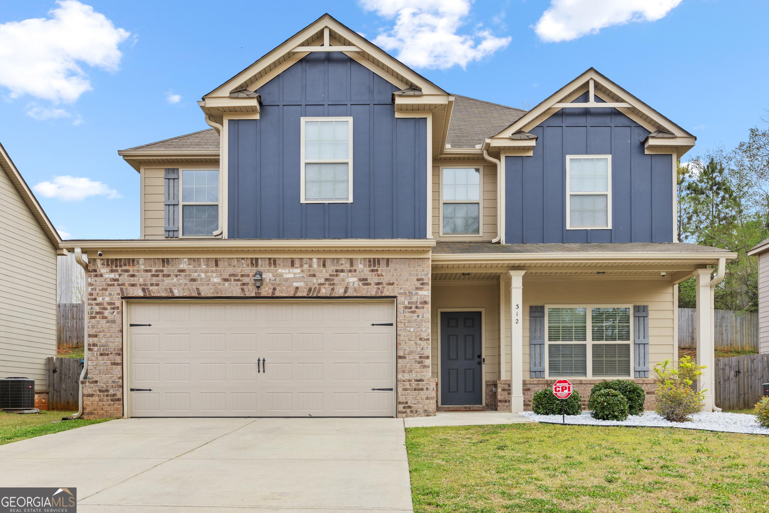 Photo one of 312 Maddi Grace Ct Locust Grove GA 30248 | MLS 10481595G
