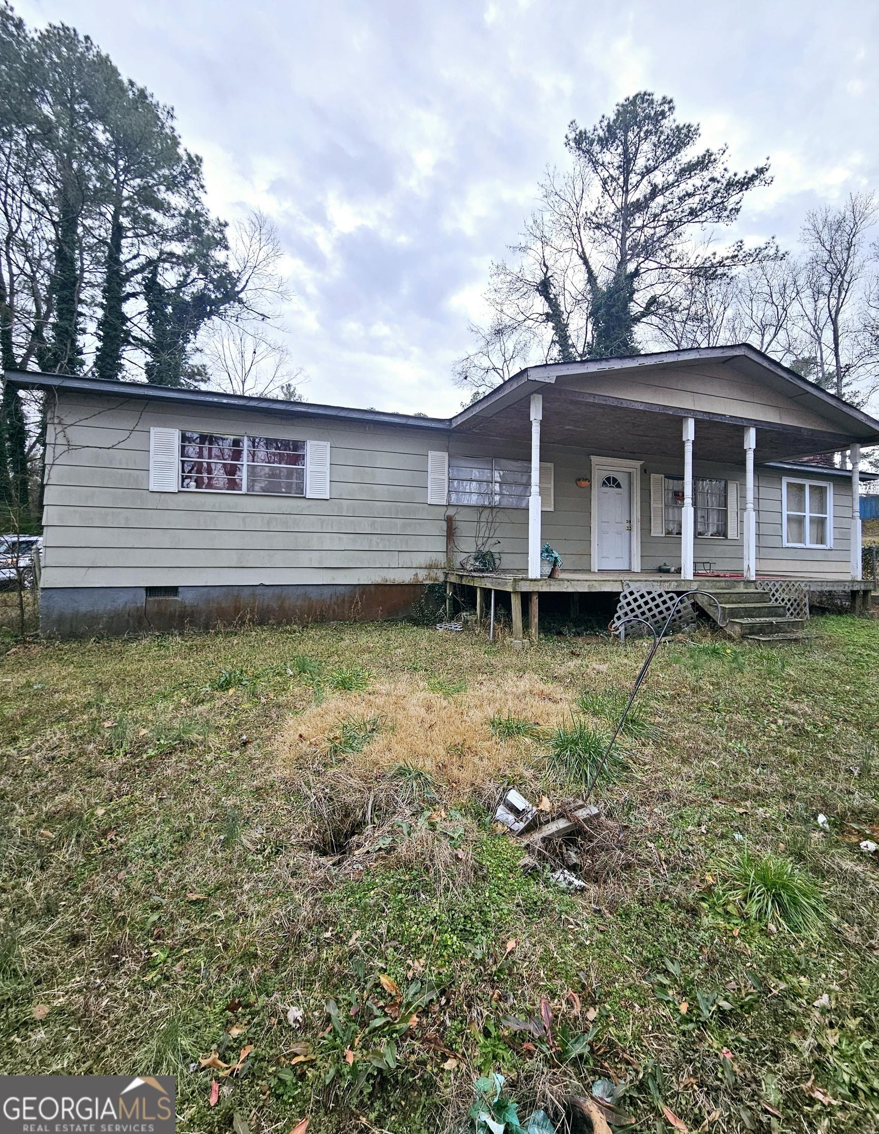 Photo one of 9135 Ford Sw St Covington GA 30014 | MLS 10482798G