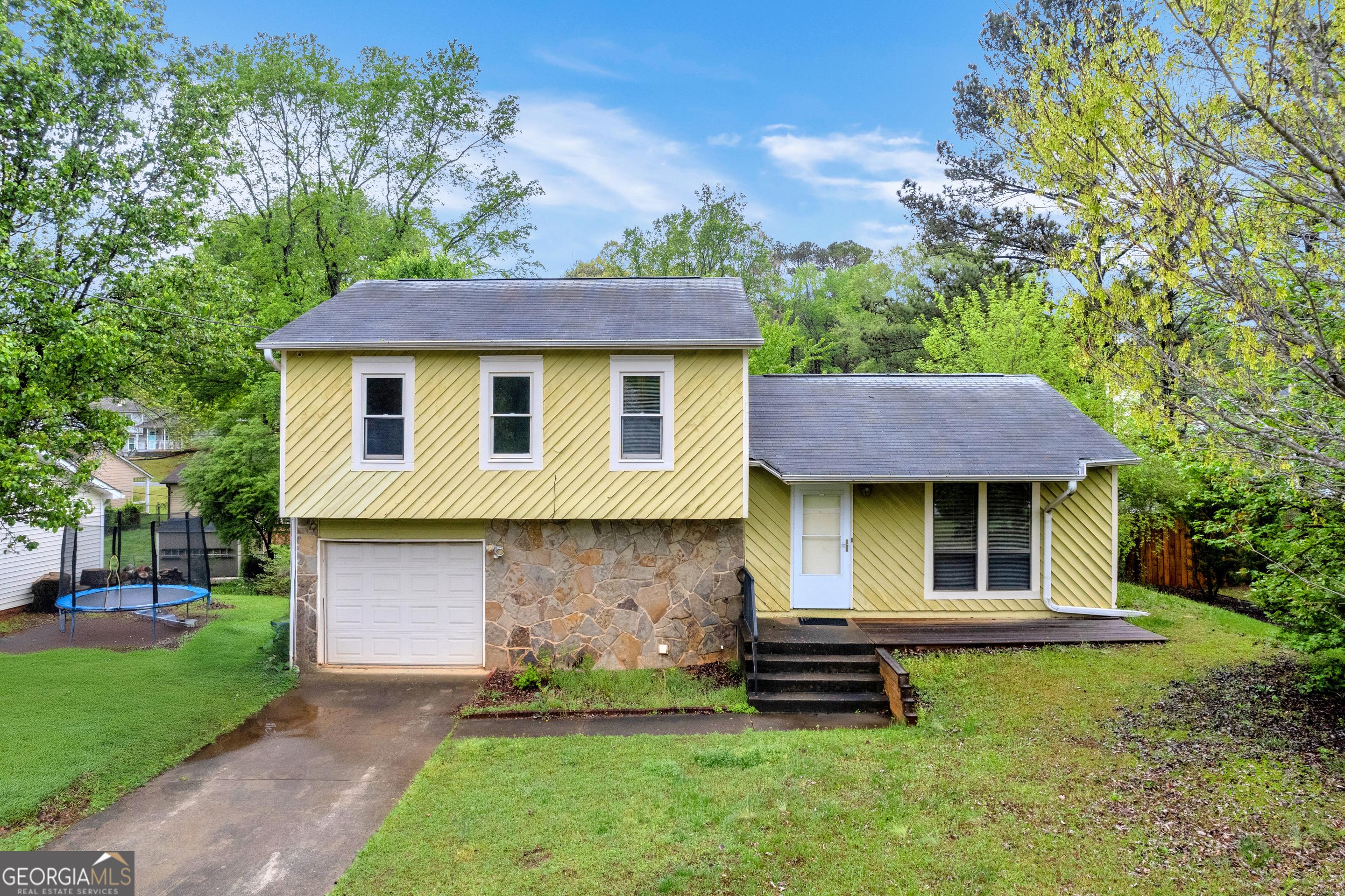 Photo one of 3121 Cruse Rd Lawrenceville GA 30044 | MLS 10496944G