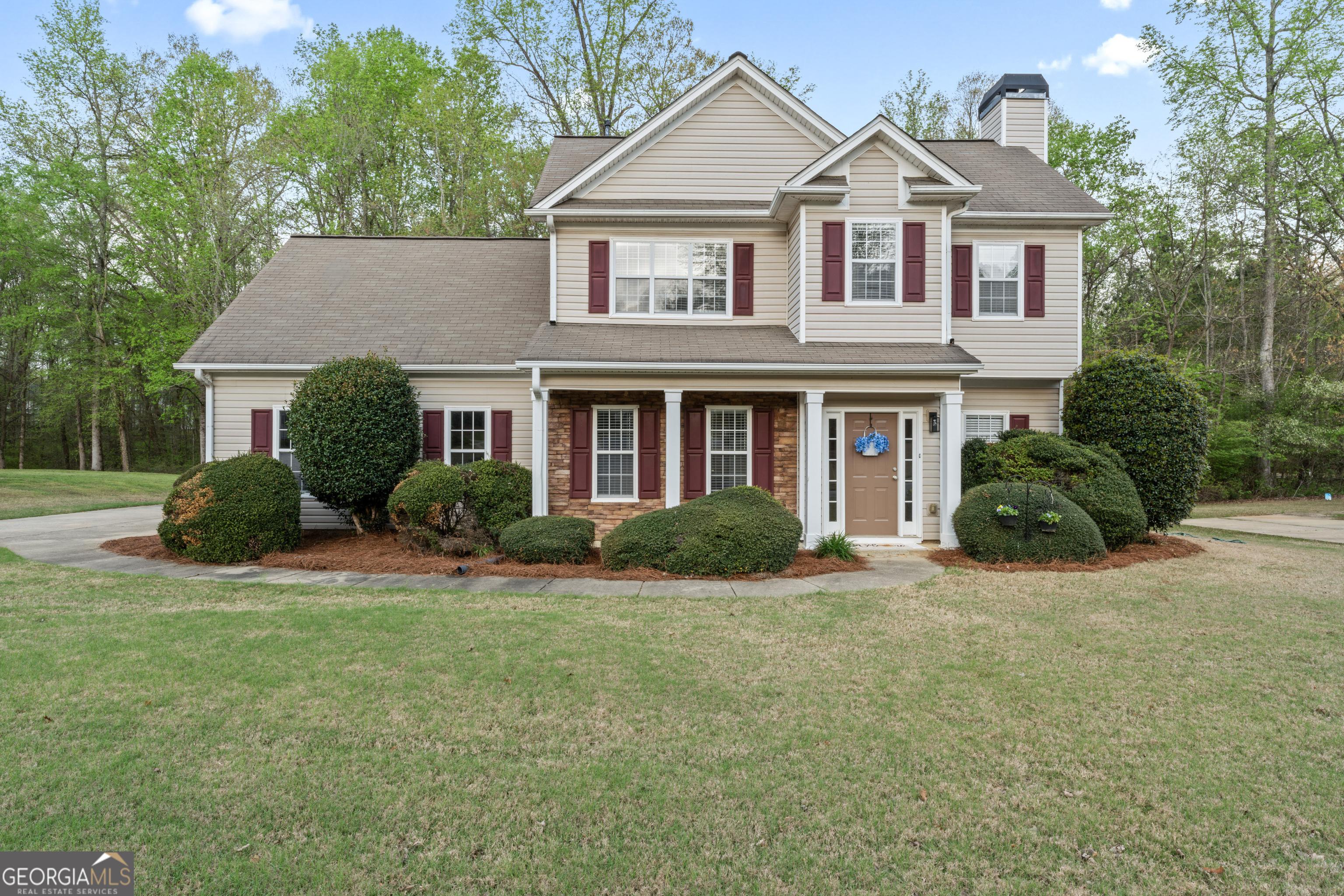 Photo one of 225 Briarsweet Way Fayetteville GA 30215 | MLS 10497500G
