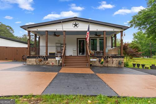 Photo one of 80 David Rd Hampton GA 30228 | MLS 10508820G
