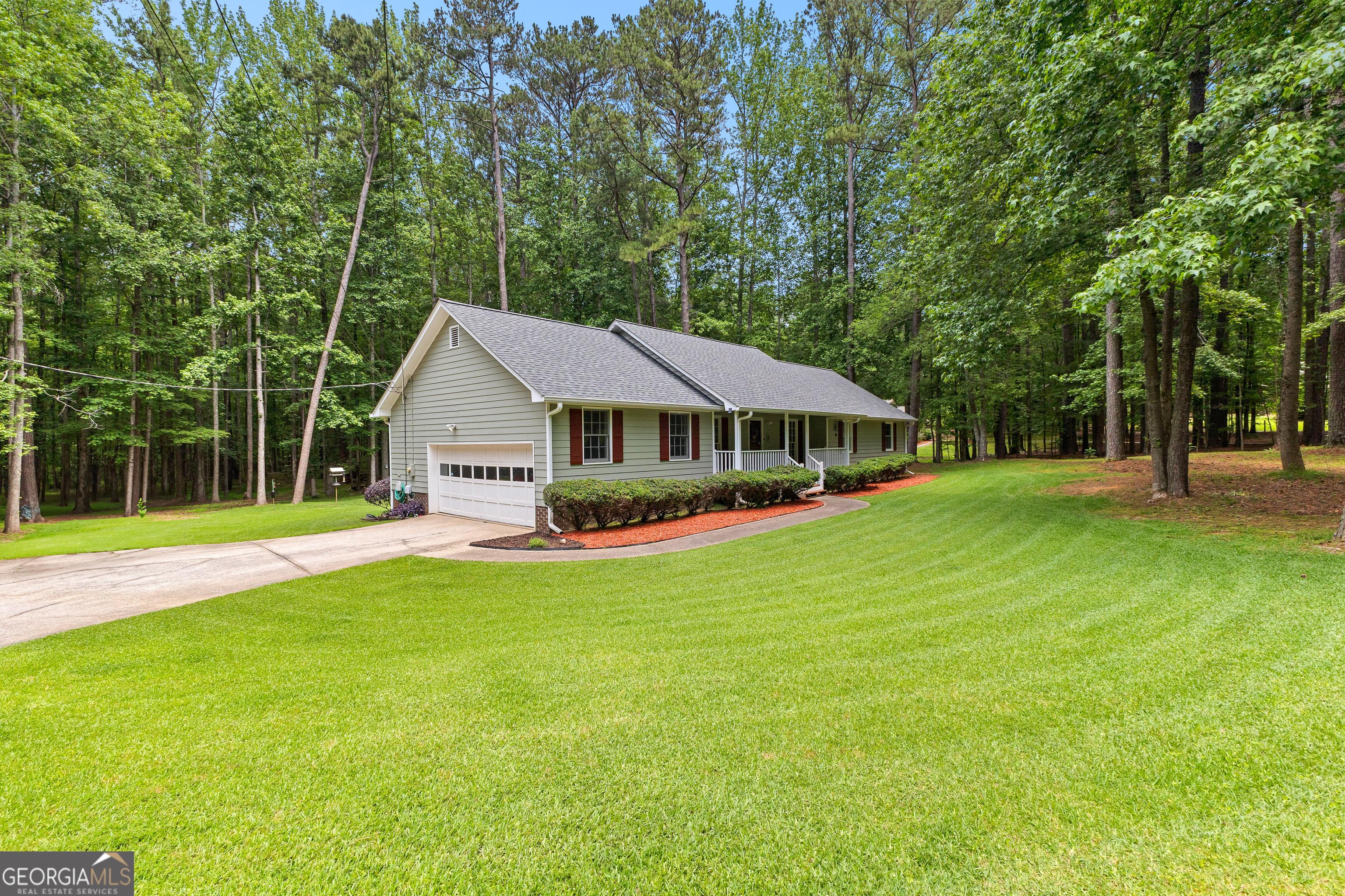 Photo one of 145 Adams Ct Fayetteville GA 30214 | MLS 10529465G