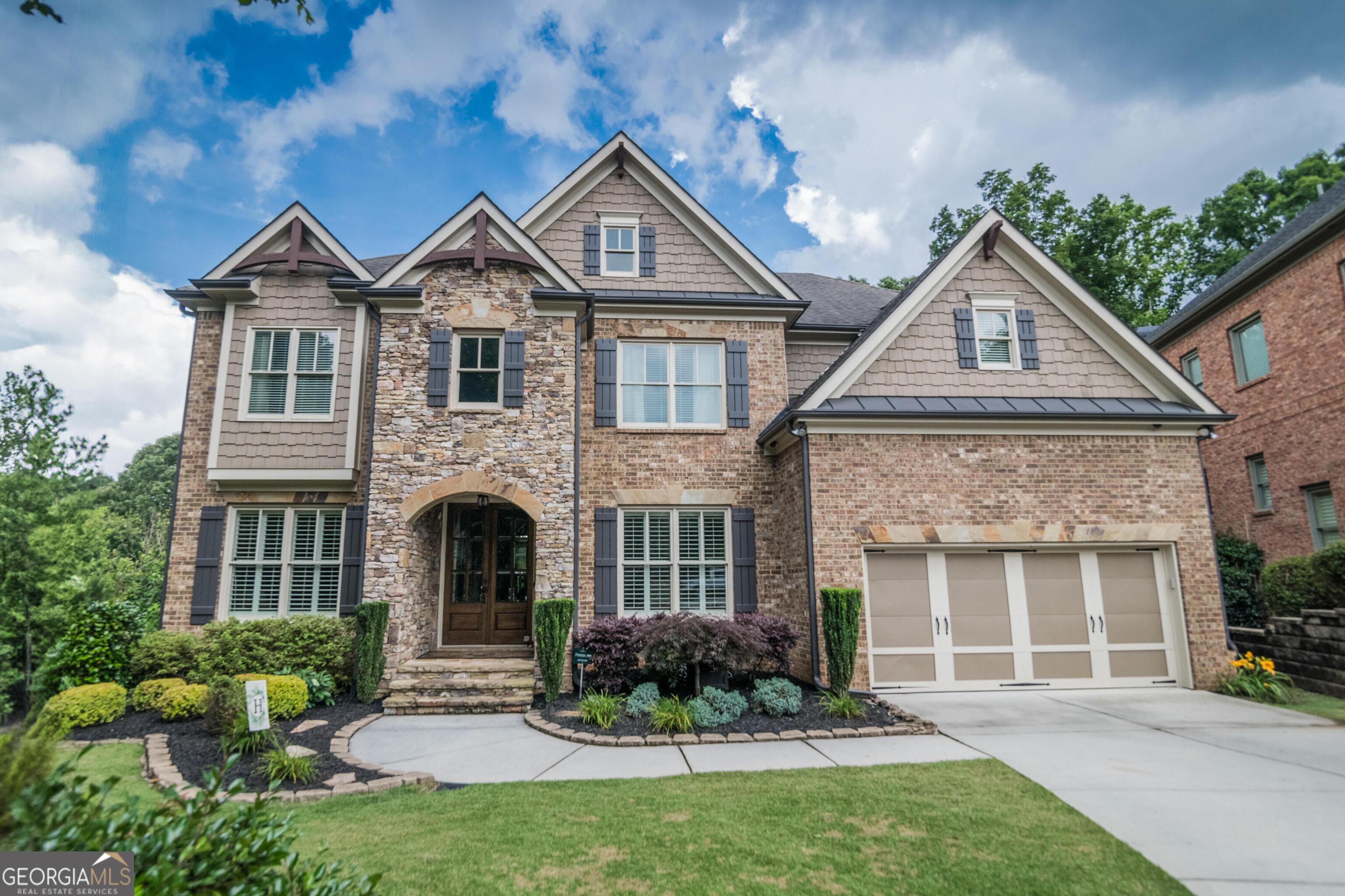 Photo one of 6248 Sunshine Cove Ln Buford GA 30518 | MLS 10543947G