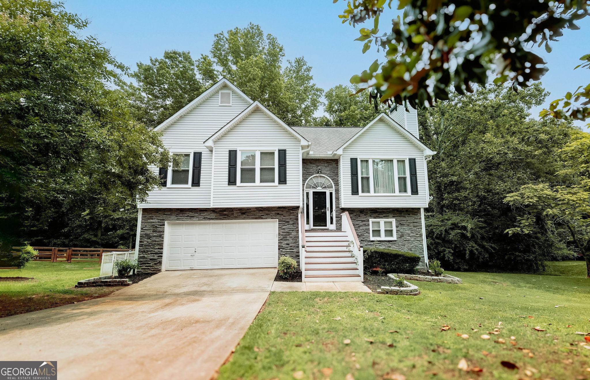 Photo one of 7030 Wessex Way Cumming GA 30028 | MLS 10546535G