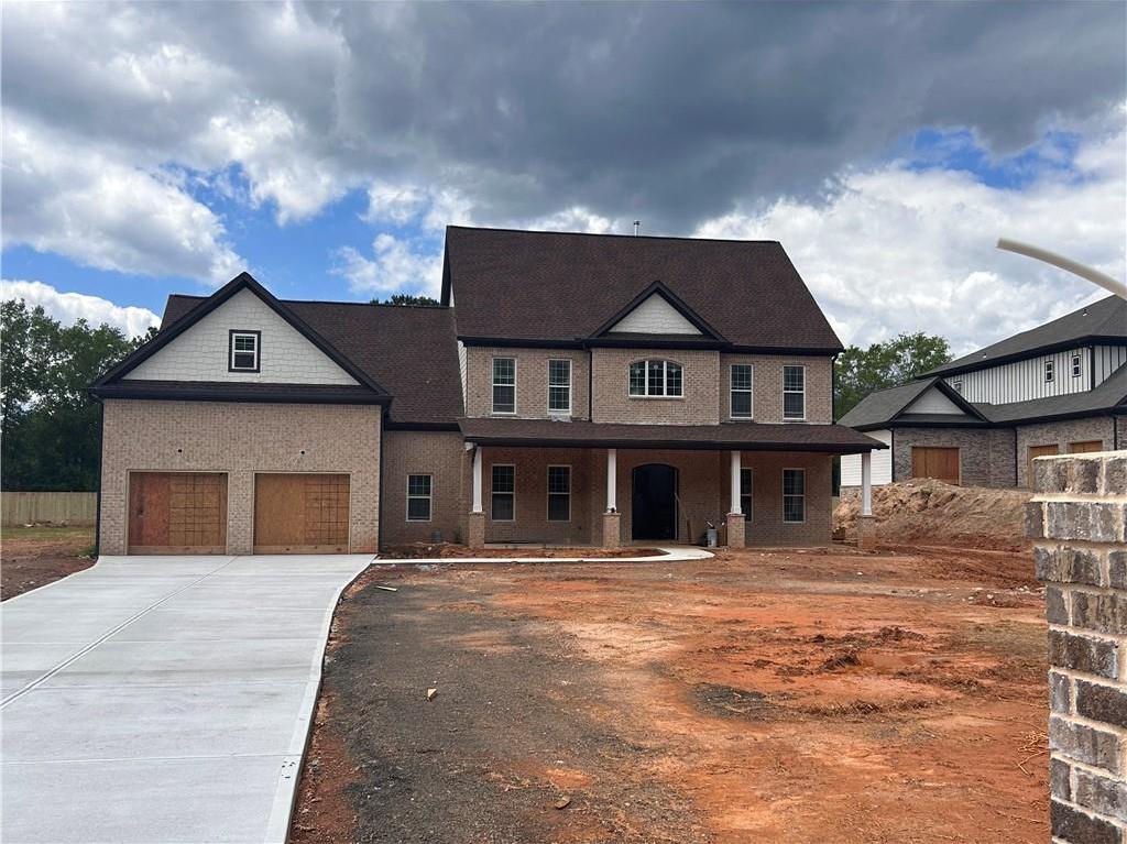 Photo one of 1937 Pucketts Sw Dr Lilburn GA 30047 | MLS 7498985F