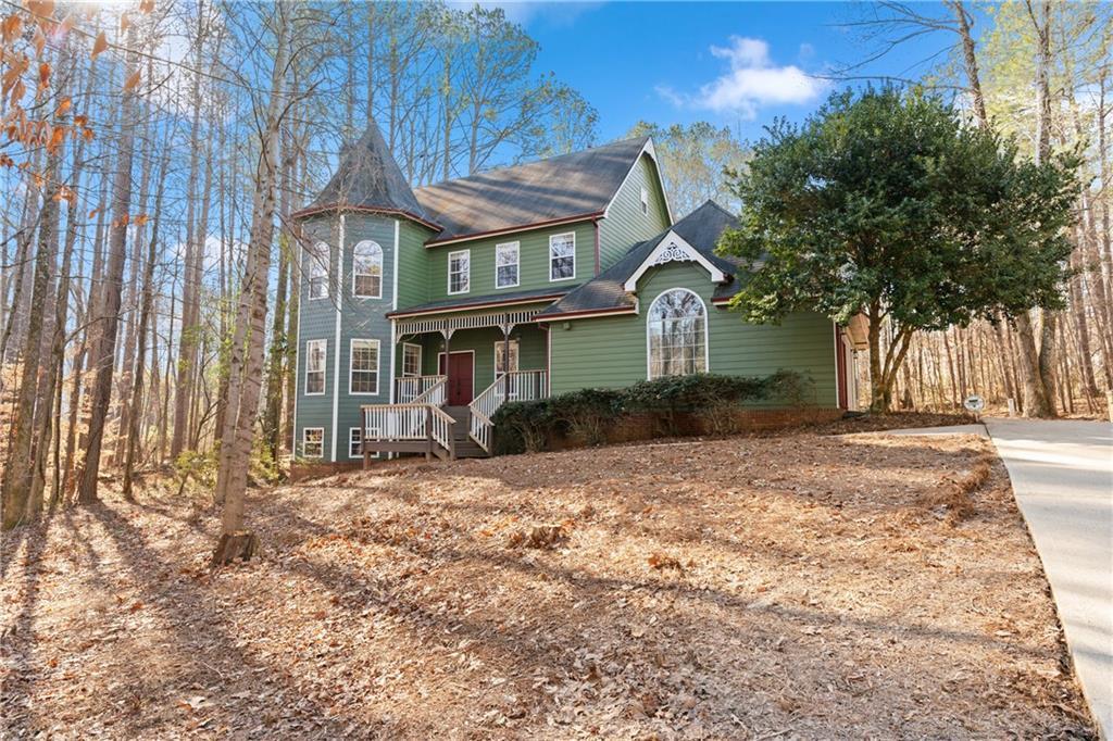 Photo one of 7825 Brands Hatch Blvd Cumming GA 30040 | MLS 7507749F