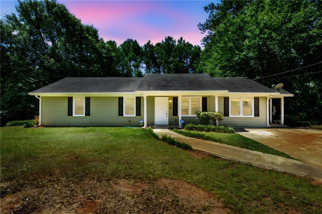 Photo one of 780 Navajo Trl Covington GA 30016 | MLS 7518694F