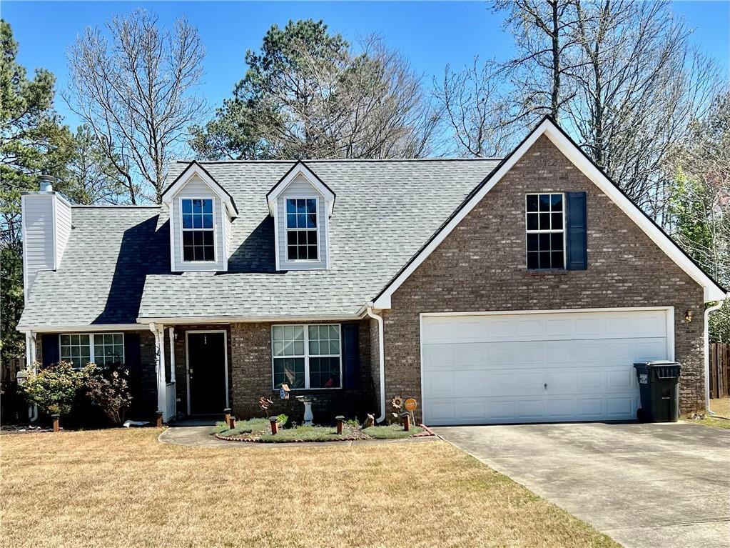 Photo one of 310 Creekside Trl Covington GA 30016 | MLS 7521087F