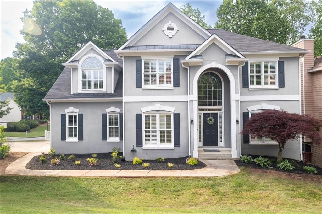 Photo one of 200 Ridge Bluff Ln Suwanee GA 30024 | MLS 7525844F