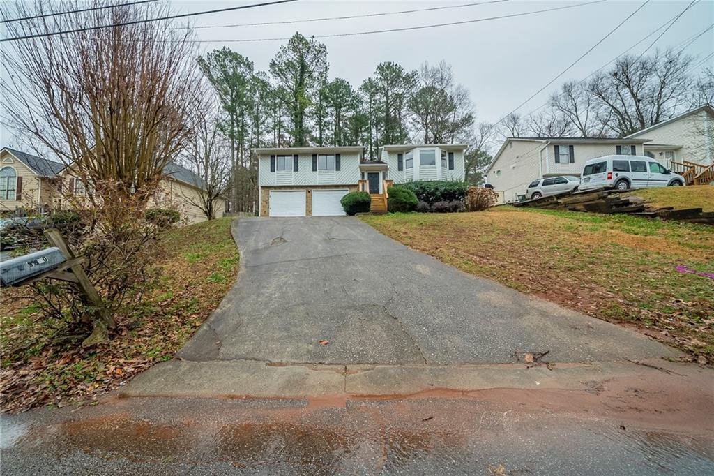 Photo one of 3500 Quail Hollow Trl Snellville GA 30039 | MLS 7527599F