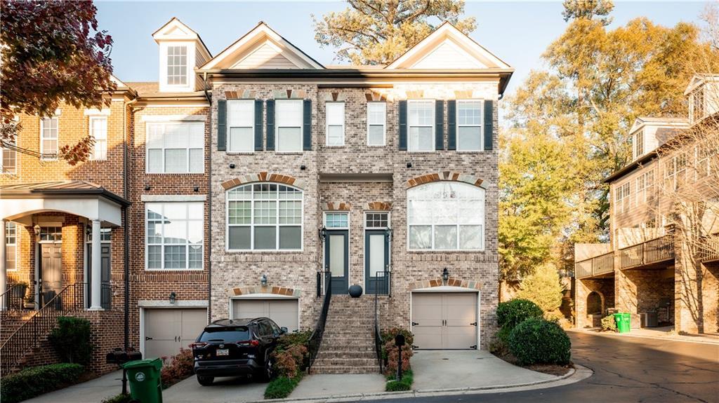 Photo one of 2661 Rivers Edge Ne Dr Atlanta GA 30324 | MLS 7528645F