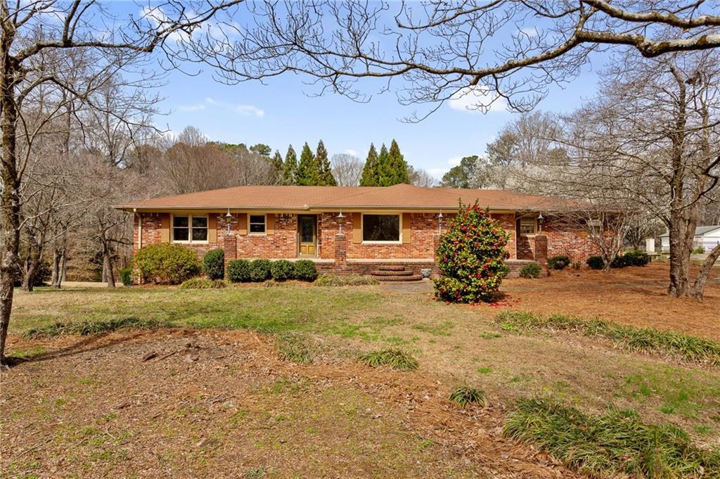 Photo one of 3241 Sewell Mill Rd Marietta GA 30062 | MLS 7533404F