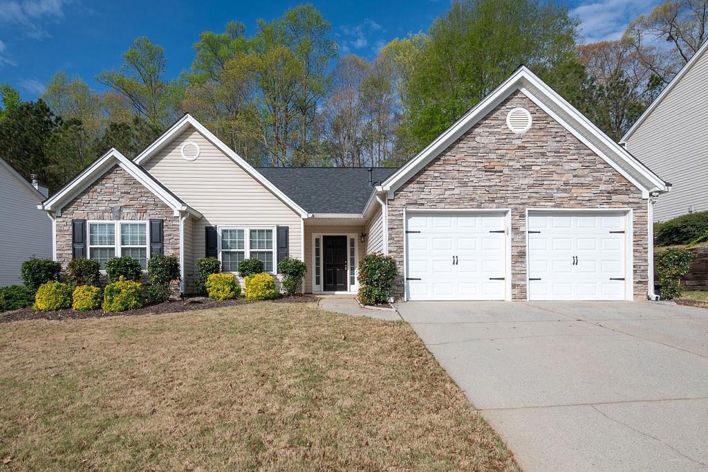 Photo one of 1851 Millwood Park Ct Buford GA 30518 | MLS 7534461F