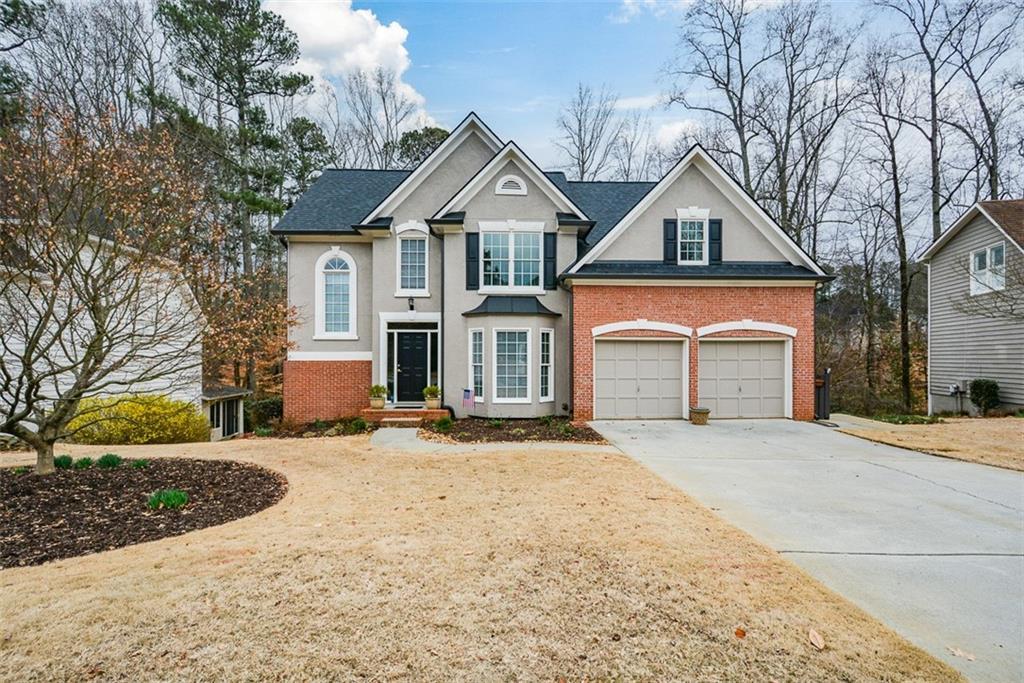 Photo one of 608 Ridge Crossing Dr Woodstock GA 30189 | MLS 7534686F