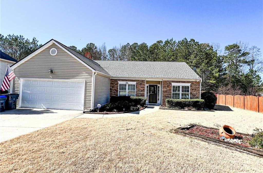 Photo one of 5710 Stephens Mill Dr Sugar Hill GA 30518 | MLS 7534911F