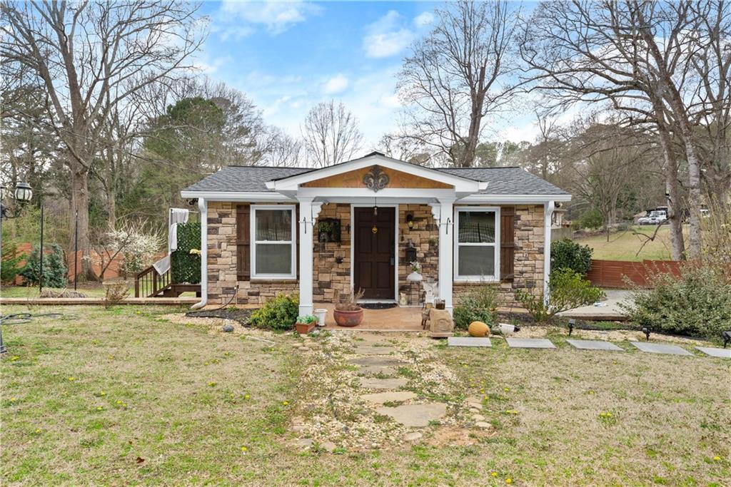 Photo one of 1164 Sandtown Sw Rd Marietta GA 30008 | MLS 7536423F