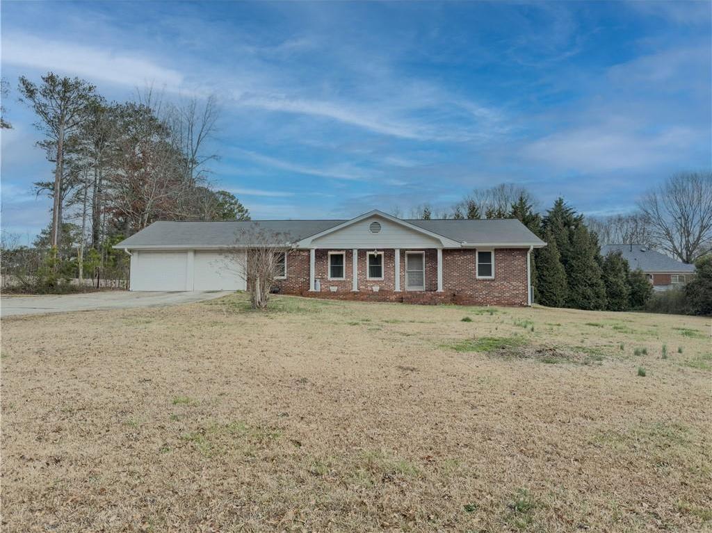 Photo one of 772 Garner Sw Rd Lilburn GA 30047 | MLS 7536465F