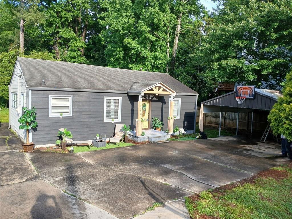 Photo one of 2077 Brockett Rd Tucker GA 30084 | MLS 7537596F