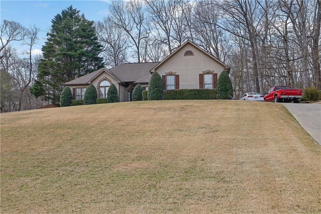 Photo one of 480 Firelite Ln Suwanee GA 30024 | MLS 7537974F