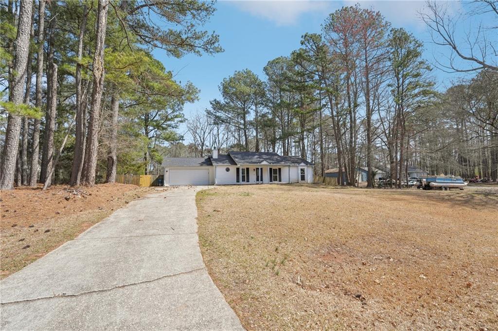 Photo one of 489 Natasha Dr Auburn GA 30011 | MLS 7538192F