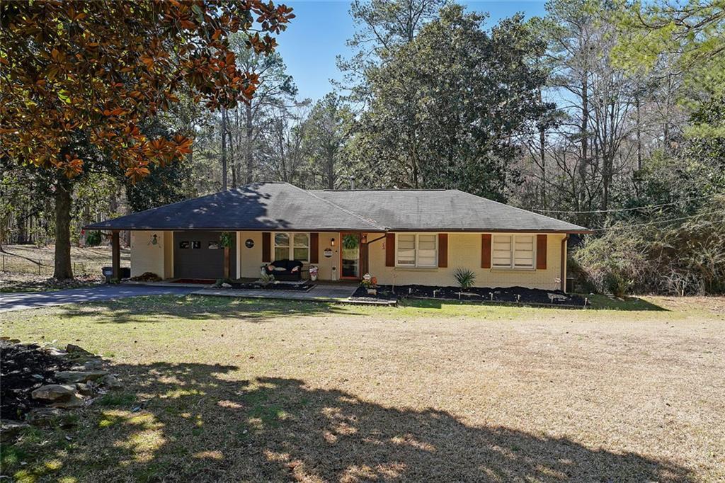 Photo one of 3948 Lake Carlton Road S Rd Loganville GA 30052 | MLS 7538201F