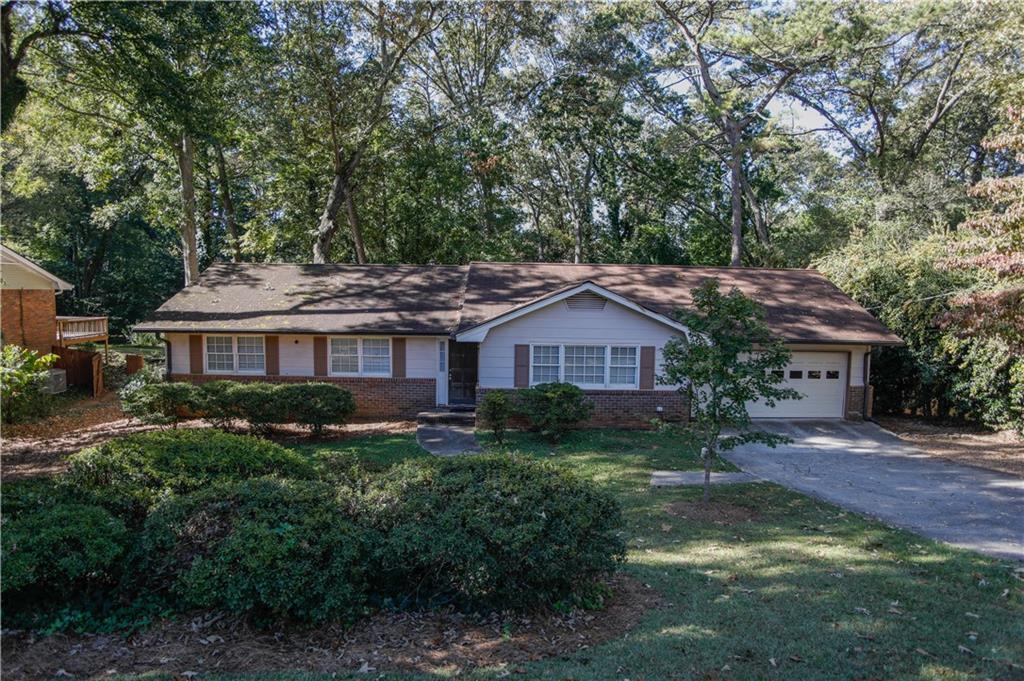 Photo one of 4042 Shady Nw Cir Lilburn GA 30047 | MLS 7538215F