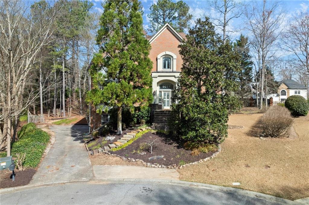 Photo one of 5043 Willeo Estates Dr Marietta GA 30068 | MLS 7538294F