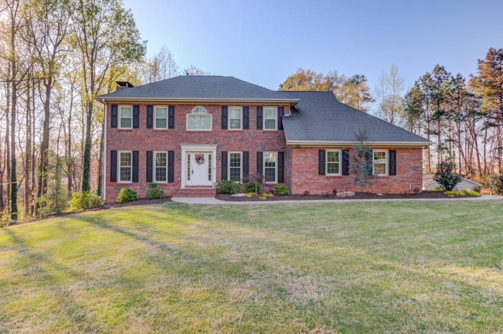 Photo one of 5020 Puritan Dr Sugar Hill GA 30518 | MLS 7538622F