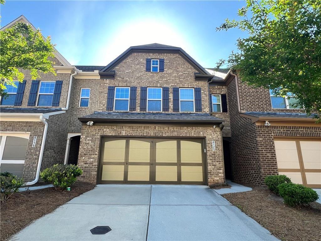 Photo one of 4125 Madison Bridge Dr Suwanee GA 30024 | MLS 7538907F