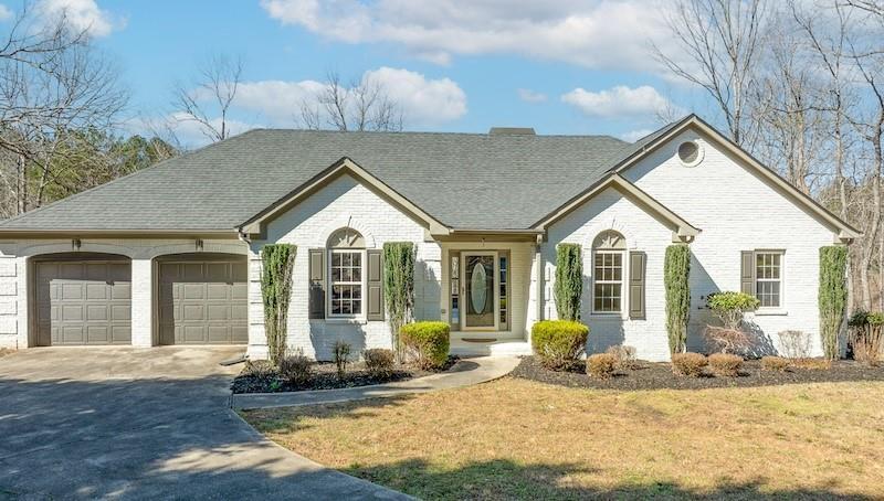 Photo one of 8160 Stone Hill Rd Cumming GA 30028 | MLS 7540143F