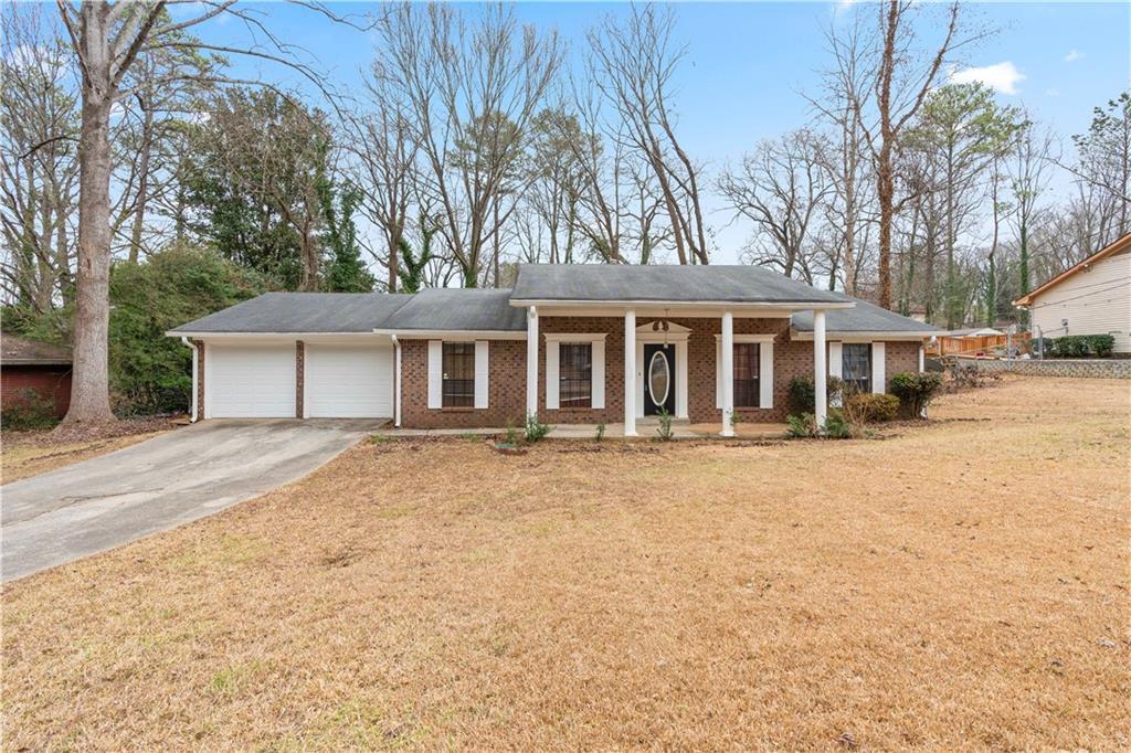 Photo one of 1850 Cashmere Ct Lithonia GA 30058 | MLS 7540198F