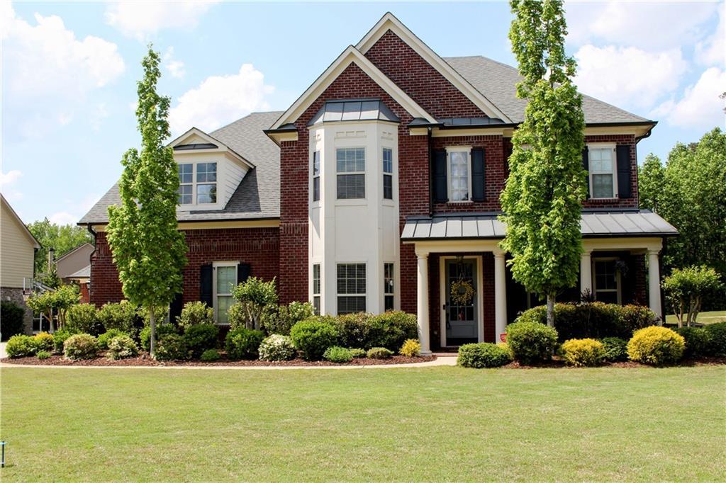 Photo one of 2480 Copper Mill Trl Cumming GA 30041 | MLS 7540396F