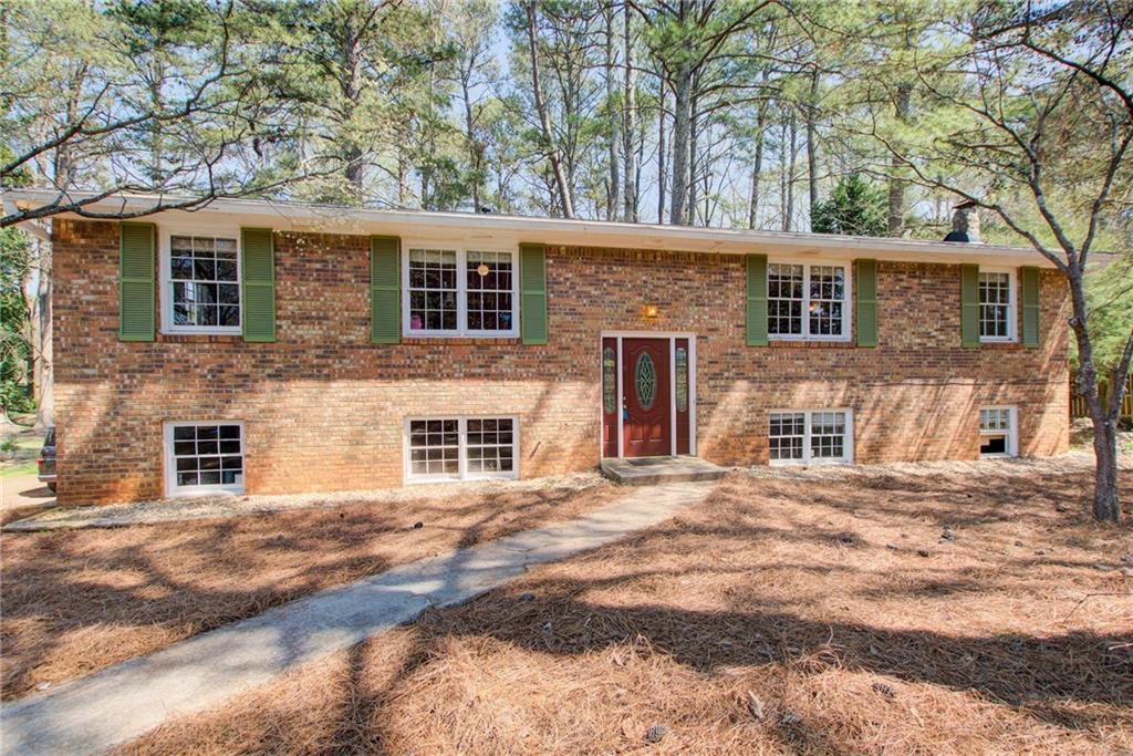 Photo one of 410 Killian Hill Sw Rd Lilburn GA 30047 | MLS 7541192F