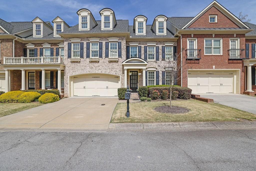 Photo one of 7467 Portbury Park Ln Suwanee GA 30024 | MLS 7541604F