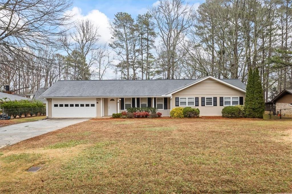 Photo one of 334 Nancy Sw Ct Lilburn GA 30047 | MLS 7542098F