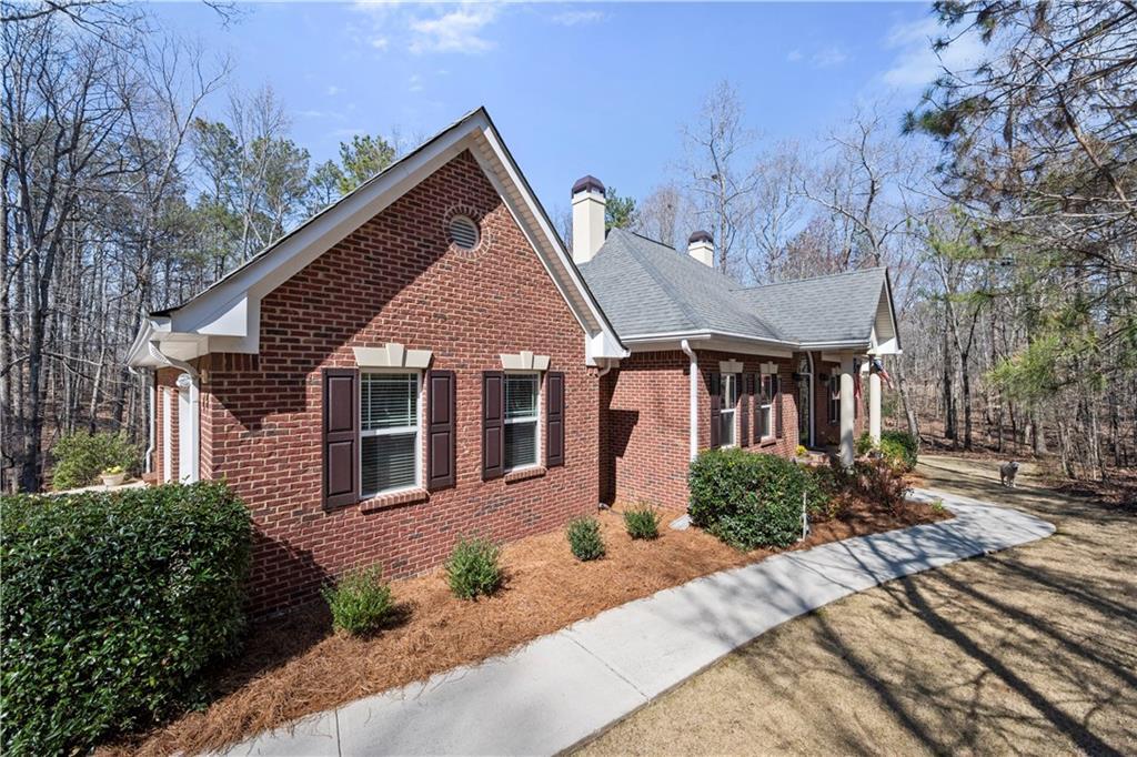 Photo one of 9246 W Banks Mill Rd Winston GA 30187 | MLS 7542296F