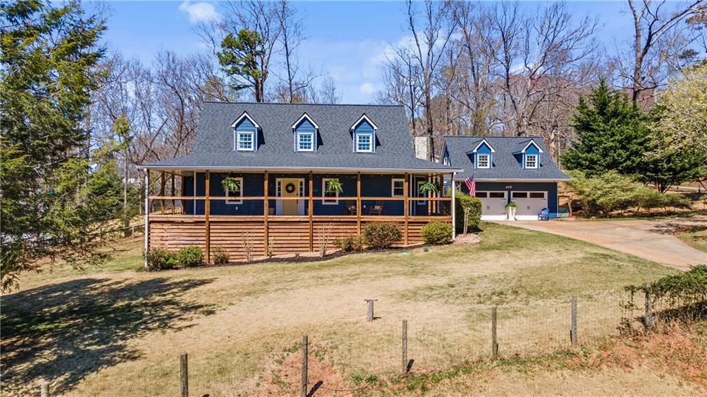 Photo one of 6510 Akins Way Cumming GA 30041 | MLS 7543072F