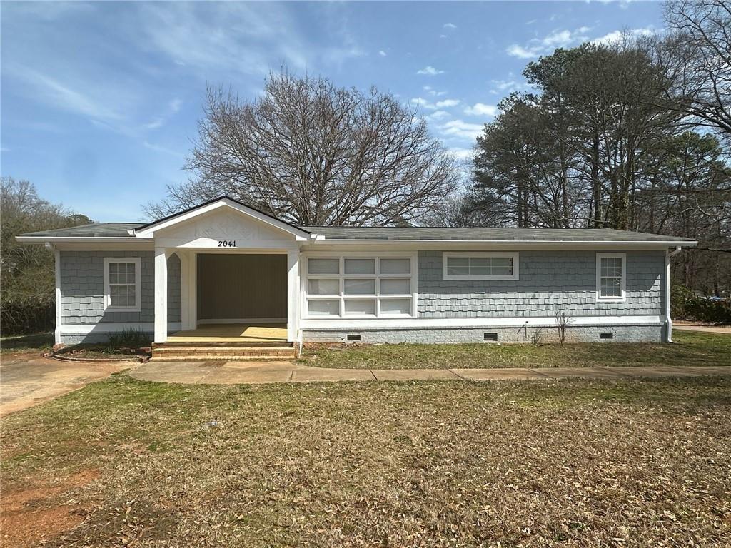 Photo one of 2041 Olive Springs Se Rd Marietta GA 30060 | MLS 7543122F