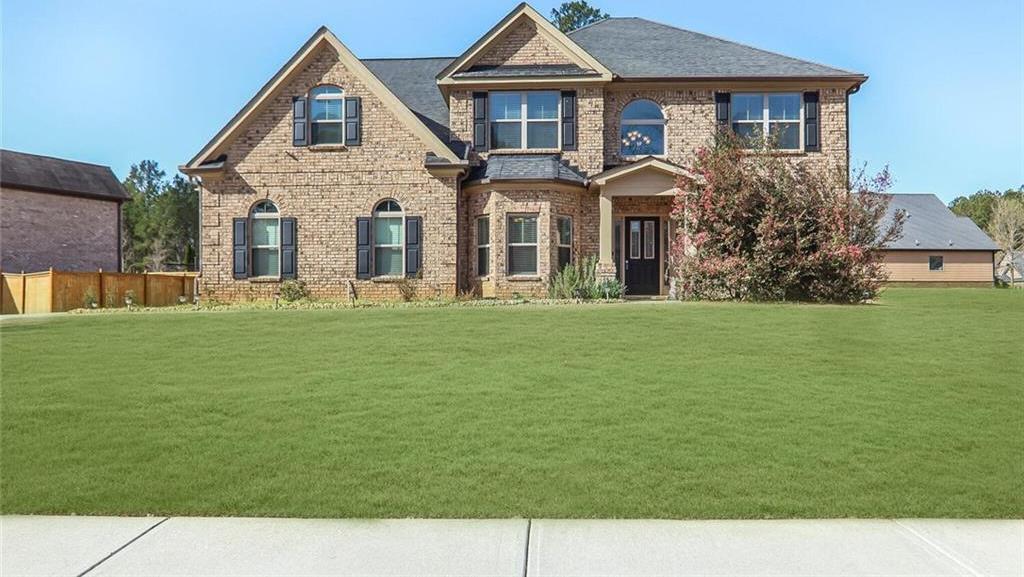 Photo one of 7347 Moss Stone Dr Conyers GA 30094 | MLS 7543209F