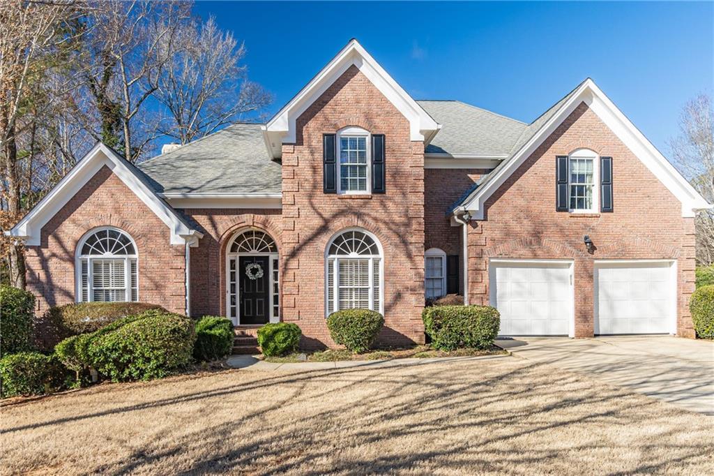 Photo one of 7145 Hartsfield Pl Suwanee GA 30024 | MLS 7543265F