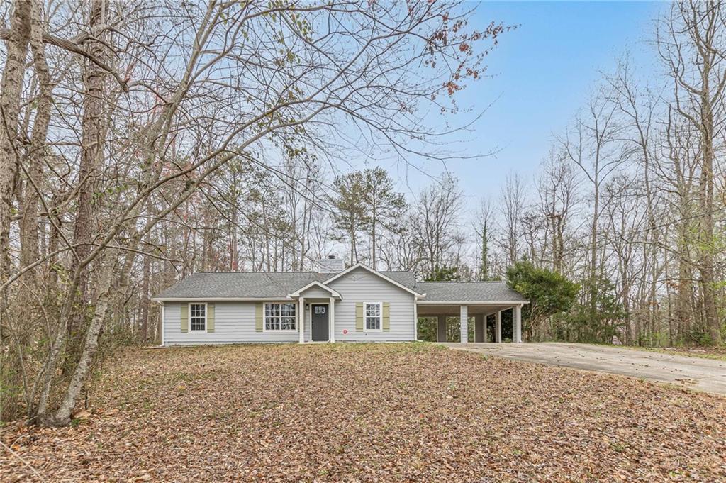 Photo one of 5001 Oakdale Dr Douglasville GA 30135 | MLS 7544203F