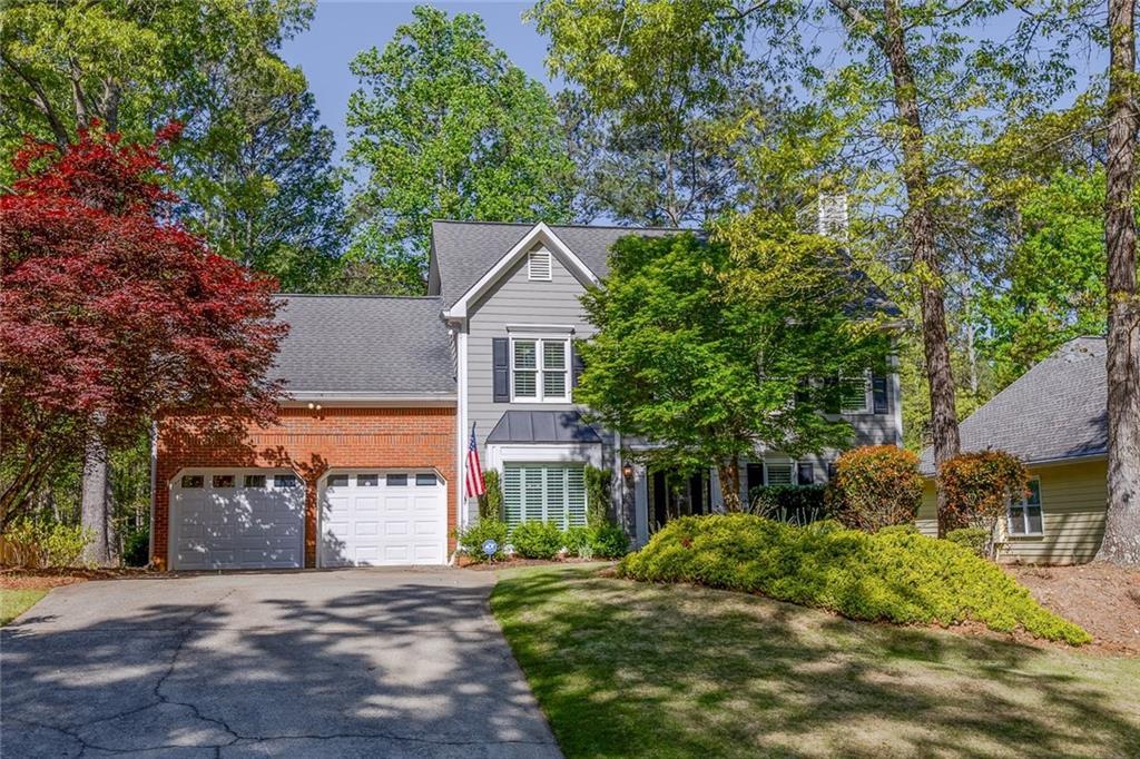 Photo one of 3107 Sandhurst Dr Woodstock GA 30189 | MLS 7547654F