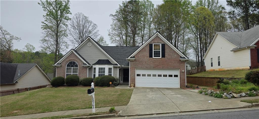 Photo one of 5763 Dexters Mill Pl Buford GA 30518 | MLS 7548769F