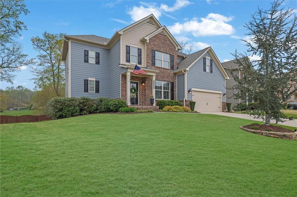 Photo one of 4040 Grandview Manor Dr Cumming GA 30028 | MLS 7552123F