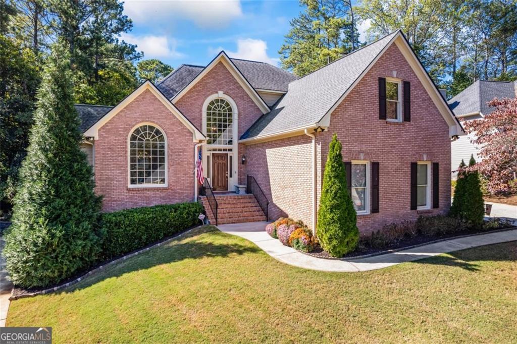 Photo one of 560 Hunt River Way Suwanee GA 30024 | MLS 7553200F