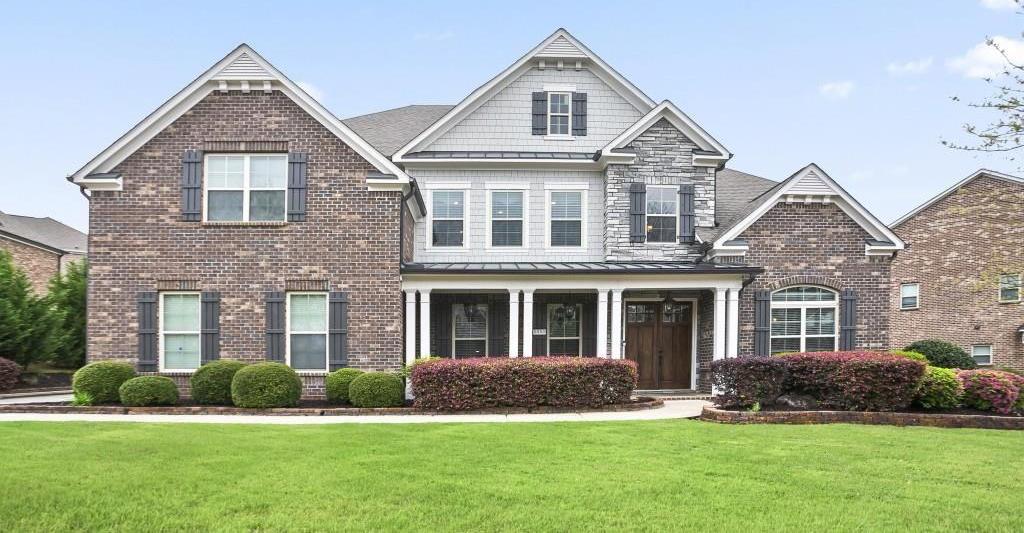Photo one of 5950 Thoroughbred Way Suwanee GA 30024 | MLS 7553641F